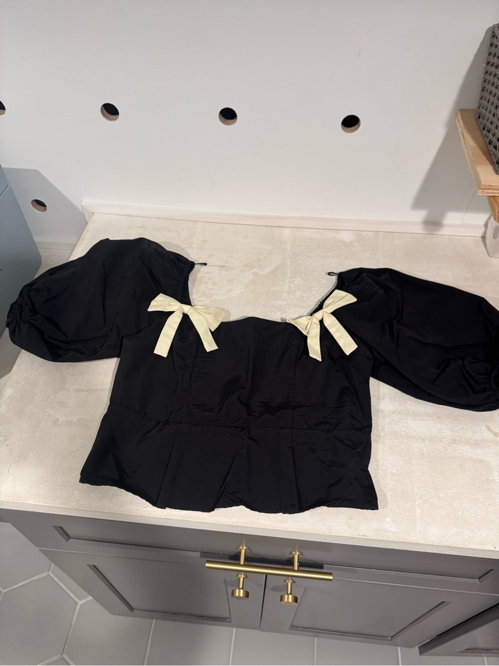 Ciao Lucia Black Puff-Sleeve Crop Top with Cream Bow Accents